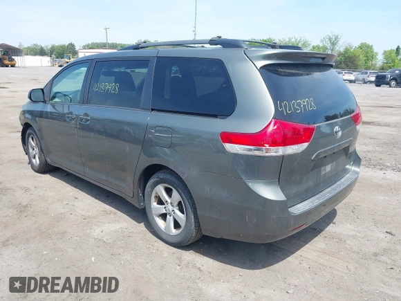 2011 Toyota Sienna LE AAS with VIN 5TDKK3DC7BS014356, listed as a IAAI auction lot 42137928 with 198,400 mi miles and . Bid and sale history available at DreamBid. Image 3.
