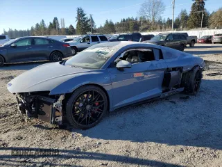 2021 Audi R8 V10 z VIN WUABAAFX8M7900919, wystawiony jako Copart lot #44812725 z przebiegiem 21 390 mil mil oraz Szkoda całkowita • Salvage title. Historia ofert i sprzedaży dostępna na DreamBid. Obrazek 1.