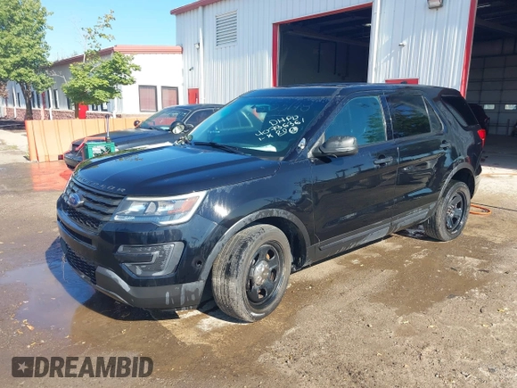 2017 Ford Police Interceptor Utility with VIN 1FM5K8AT7HGB55148, listed as a IAAI auction lot 40736361 with 100,962 mi miles and . Bid and sale history available at DreamBid. Image 2.