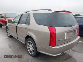 2004 Cadillac SRX with VIN 1GYEE63A140164260, listed as a IAAI auction lot 41516523 with 113,187 mi miles. Bid and sale history available at carsss.com. Image 3.