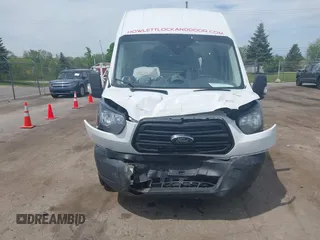 2019 Ford Transit with VIN 1FTYR2XG0KKA22854, listed as a IAAI auction lot 42245141 with 157,886 mi miles and . Bid and sale history available at DreamBid. Image 6.