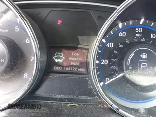 2013 Hyundai Sonata GLS z VIN 5NPEB4AC7DH726866, wystawiony jako IAAI lot #42306731 z przebiegiem 164 122 mil mil oraz . Historia ofert i sprzedaży dostępna na DreamBid. Obrazek 7.