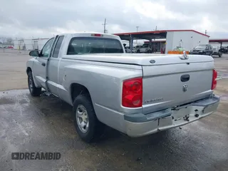 2005 Dodge Dakota ST with VIN 1D7HE22K25S119460, listed as a IAAI auction lot 41790592 with 104,995 mi miles and . Bid and sale history available at DreamBid. Image 3.