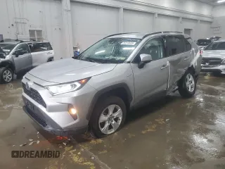 2020 Toyota RAV4 Hybrid XLE with VIN 2T3R6RFV1LW001235, listed as a Copart auction lot 56818635 with 105,234 mi miles and Salvage title. Bid and sale history available at DreamBid. Image 1.