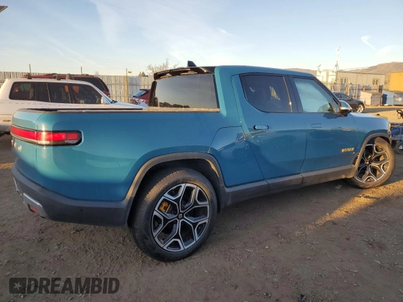 2022 Rivian R1T Launch Edition with VIN 7FCTGAAL5NN001219, listed as a Copart auction lot 86623924 with Not Provided miles and Salvage Title. Bid and sale history available at DreamBid. Image 3.