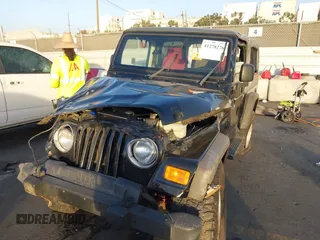 2005 Jeep Wrangler Unlimited with VIN 1J4FA44S35P314941, listed as a IAAI auction lot 41278276 with 248,865 mi miles. Bid and sale history available at carsss.com. Image 6.