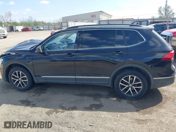 2021 Volkswagen Tiguan SE with VIN 3VV3B7AX3MM157702, listed as a IAAI auction lot 41888479 with 51,807 mi miles and . Bid and sale history available at DreamBid. Image 13.