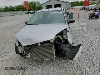 2007 Ford Focus S z VIN 1FAFP34N37W293421, wystawiony jako Copart lot #57833445 z przebiegiem 159 523 mil mil oraz Szkoda całkowita • Salvage title. Historia ofert i sprzedaży dostępna na DreamBid. Obrazek 14.
