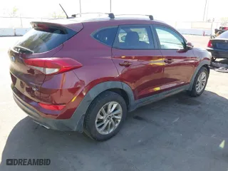 2016 Hyundai Tucson Limited with VIN KM8J33A26GU063454, listed as a IAAI auction lot 41975782 with 74,519 mi miles. Bid and sale history available at carsss.com. Image 4.