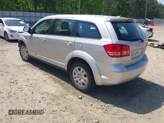 2014 Dodge Journey American Value with VIN 3C4PDCAB5ET112789, listed as a IAAI auction lot 42072546 with 149,094 mi miles and . Bid and sale history available at DreamBid. Image 3.