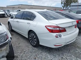 2017 Honda Accord Hybrid with VIN JHMCR6F36HC008930, listed as a IAAI auction lot 41601414 with 159,359 mi miles. Bid and sale history available at carsss.com. Image 3.