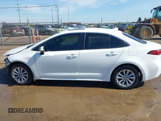 2024 Toyota Corolla Hybrid LE with VIN JTDBCMFEXR3055271, listed as a IAAI auction lot 41396359 with 8,654 mi miles. Bid and sale history available at carsss.com. Image 15.