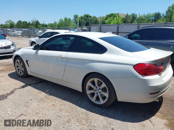 2015 BMW 4 Series 428i xDrive with VIN WBA3N5C58FK198596, listed as a IAAI auction lot 42514820 with 107,261 mi miles and . Bid and sale history available at DreamBid. Image 3.