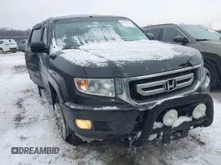 2011 Honda Ridgeline RTS with VIN 5FPYK1F48BB005889, listed as a IAAI auction lot 41268938 with 146,974 mi miles. Bid and sale history available at carsss.com. Image 1.