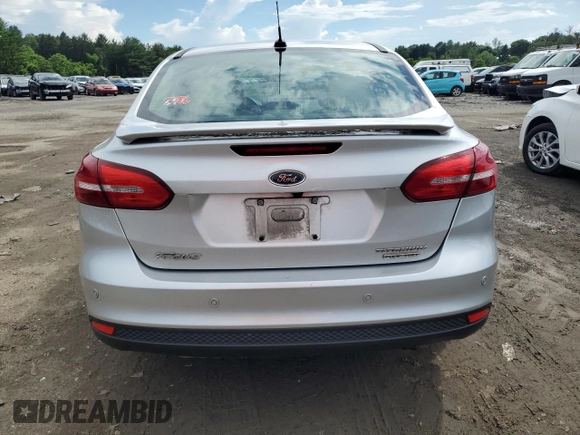 2015 Ford Focus Titanium with VIN 1FADP3J27FL285842, listed as a Copart auction lot 61159935 with 79,215 mi miles and Salvage title. Bid and sale history available at DreamBid. Image 6.