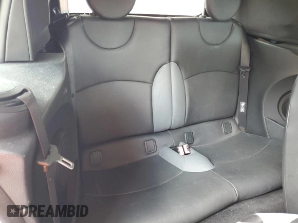 2010 MINI Convertible with VIN WMWMR3C59ATU98597, listed as a Copart auction lot 53336025 with 88,273 mi miles and Salvage Title. Bid and sale history available at DreamBid. Image 10.