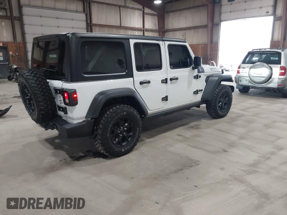 2023 Jeep Wrangler Sport S with VIN 1C4HJXDN2PW632584, listed as a IAAI auction lot 41965191 with 20,288 mi miles and . Bid and sale history available at DreamBid. Image 4.