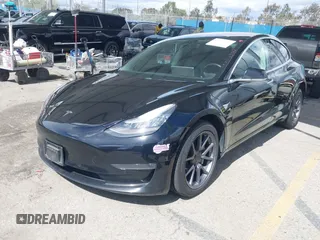 2019 Tesla Model 3 Mid Range with VIN 5YJ3E1EA3KF325056, listed as a IAAI auction lot 41771543 with 183,157 mi miles and . Bid and sale history available at carsss.com. Image 17.
