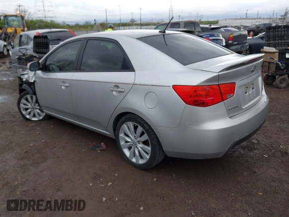 2010 Kia Forte SX with VIN KNAFW4A39A5230517, listed as a IAAI auction lot 41953297 with 154,711 mi miles. Bid and sale history available at carsss.com. Image 3.