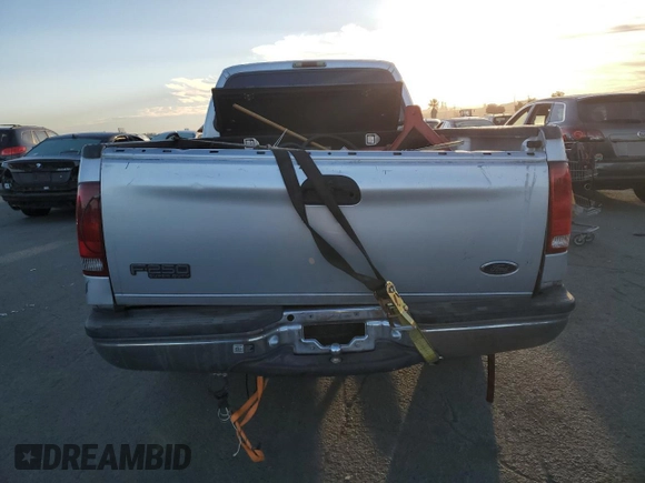 1999 Ford Super Duty F-250 XL with VIN 1FTNX20F3XED60894, listed as a Copart auction lot 74849284 with 148,779 mi miles and Salvage Title. Bid and sale history available at carsss.com. Image 6.