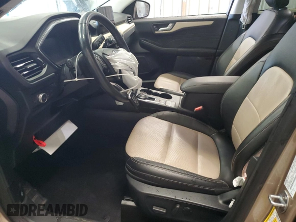 2021 Ford Escape Titanium with VIN 1FMCU9J90MUB15582, listed as a Copart auction lot 50982955 with 27,041 mi miles and Salvage Title. Bid and sale history available at carsss.com. Image 7.