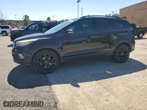 2017 Ford Escape Titanium with VIN 1FMCU0J93HUE84535, listed as a Copart auction lot 48172295 with 92,973 mi miles and Salvage Title. Bid and sale history available at carsss.com. Image 1.