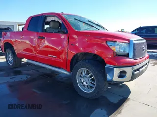 2011 Toyota Tundra with VIN 5TFRM5F18BX021441, listed as a IAAI auction lot 40901511 with 218,836 mi miles and . Bid and sale history available at DreamBid. Image 1.