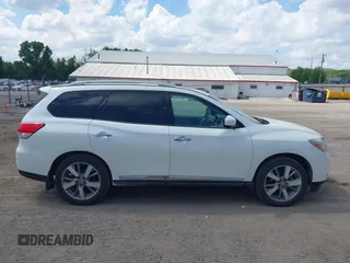 2015 Nissan Pathfinder SL with VIN 5N1AR2MM0FC707380, listed as a IAAI auction lot 42267523 with 186,383 mi miles and . Bid and sale history available at DreamBid. Image 13.