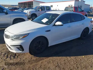 2019 Kia Optima LX with VIN 5XXGT4L39KG280991, listed as a IAAI auction lot 41639322 with 107,039 mi miles. Bid and sale history available at carsss.com. Image 2.