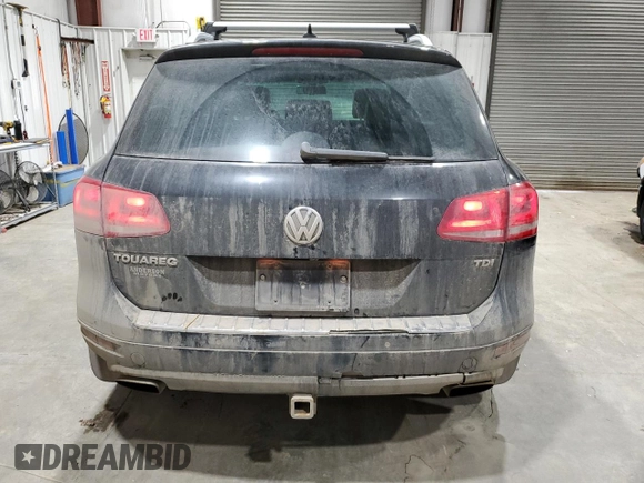 2011 Volkswagen Touareg Exec with VIN WVGFK9BP6BD006430, listed as a Copart auction lot 84288014 with 186,189 mi miles and Salvage Title. Bid and sale history available at DreamBid. Image 6.