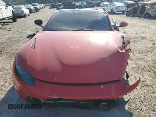 2020 Aston Martin Vantage z VIN SCFSMGAWXLGN03122, wystawiony jako Copart lot #77734374 z przebiegiem Nie podano mil oraz Szkoda całkowita • Salvage title. Historia ofert i sprzedaży dostępna na DreamBid. Obrazek 12.