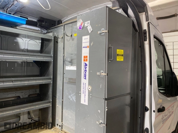 2020 Ford Transit Cargo with VIN 1FTBR1CG6LKA17312, listed as a IAAI auction lot 42284054 with 173,479 mi miles and . Bid and sale history available at DreamBid. Image 4.
