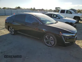 2018 Honda Clarity Plug-In Hybrid Touring with VIN JHMZC5F3XJC006917, listed as a Copart auction lot 76447164 with 68,889 mi miles and Salvage Title. Bid and sale history available at carsss.com. Image 4.