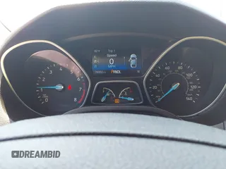 2015 Ford Focus SE with VIN 1FADP3F25FL300945, listed as a IAAI auction lot 42483699 with 76,992 mi miles and . Bid and sale history available at DreamBid. Image 7.