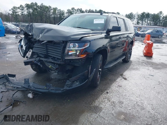 2020 Chevrolet Suburban LT z VIN 1GNSKHKC3LR170868, wystawiony jako IAAI lot #41575519 z przebiegiem 131 080 mil mil oraz . Historia ofert i sprzedaży dostępna na DreamBid. Obrazek 17.