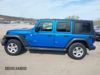 2021 Jeep Wrangler Unlimited Sport S z VIN 1C4HJXDG4MW743151, wystawiony jako IAAI lot #42204776 z przebiegiem 42 363 mil mil oraz . Historia ofert i sprzedaży dostępna na DreamBid. Obrazek 14.