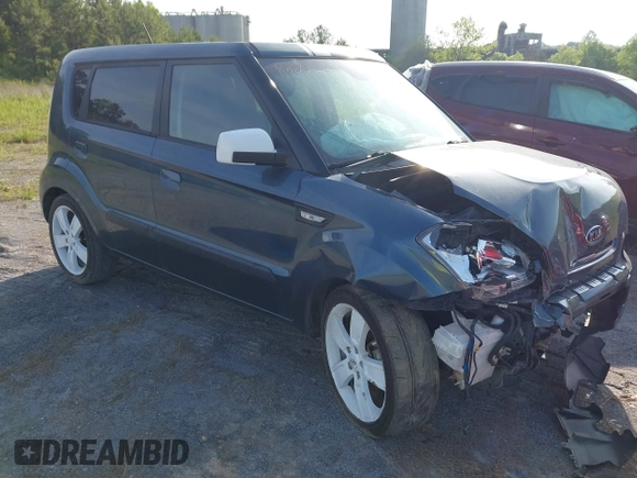 2010 Kia Soul + with VIN KNDJT2A23A7069815, listed as a IAAI auction lot 40173837 with 116,028 mi miles. Bid and sale history available at carsss.com. Image 1.