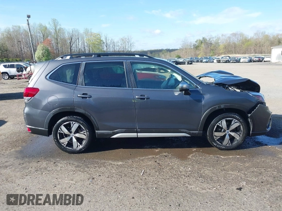 2020 Subaru Forester Touring with VIN JF2SKAXC0LH601036, listed as a IAAI auction lot 41911952 with 102,257 mi miles. Bid and sale history available at carsss.com. Image 13.
