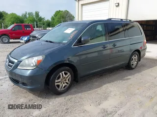 2006 Honda Odyssey EX with VIN 5FNRL384X6B401671, listed as a IAAI auction lot 42081914 with 229,219 mi miles. Bid and sale history available at carsss.com. Image 2.