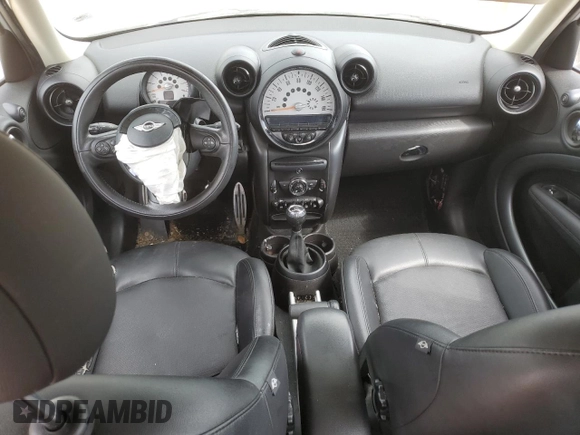 2014 MINI Countryman S with VIN WMWZC5C55EWM18087, listed as a Copart auction lot 68661614 with Not provided miles and Salvage title. Bid and sale history available at DreamBid. Image 8.