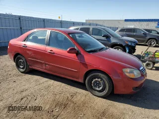 2009 Kia Spectra EX with VIN KNAFE221395656476, listed as a Copart auction lot 77700844 with 90,079 mi miles and Salvage Title. Bid and sale history available at carsss.com. Image 4.