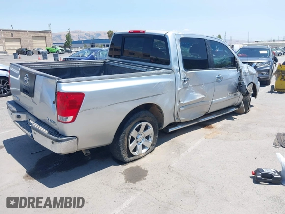 2007 Nissan Titan XE with VIN 1N6AA07A57N200866, listed as a IAAI auction lot 42563440 with 193,188 mi miles and . Bid and sale history available at DreamBid. Image 4.
