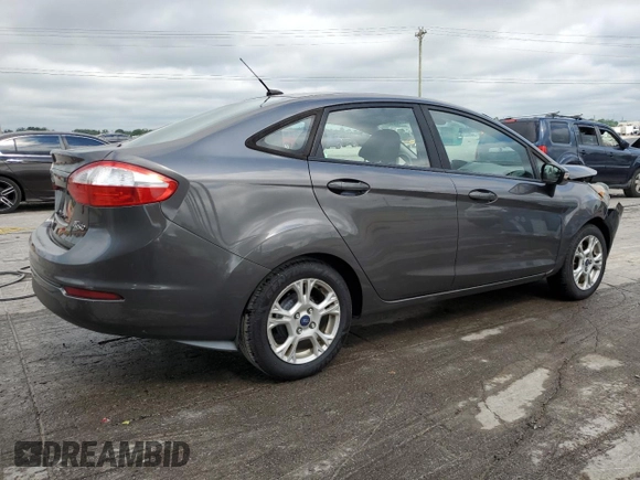2015 Ford Fiesta SE z VIN 3FADP4BJ2FM114569, wystawiony jako Copart lot #56785265 z przebiegiem 71 045 mil mil oraz Szkoda całkowita • Salvage title. Historia ofert i sprzedaży dostępna na DreamBid. Obrazek 3.