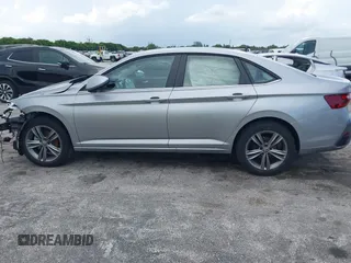 2024 Volkswagen Jetta SE z VIN 3VWEM7BU9RM057291, wystawiony jako IAAI lot #42346409 z przebiegiem 22 301 mil mil oraz . Historia ofert i sprzedaży dostępna na DreamBid. Obrazek 14.