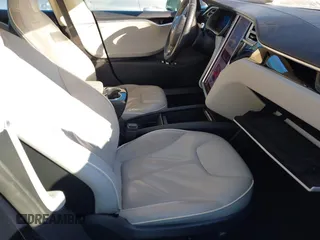 2014 Tesla Model S 60 z VIN 5YJSA1H15EFP48938, wystawiony jako IAAI lot #41574976 z przebiegiem 230 246 mil mil oraz . Historia ofert i sprzedaży dostępna na DreamBid. Obrazek 5.