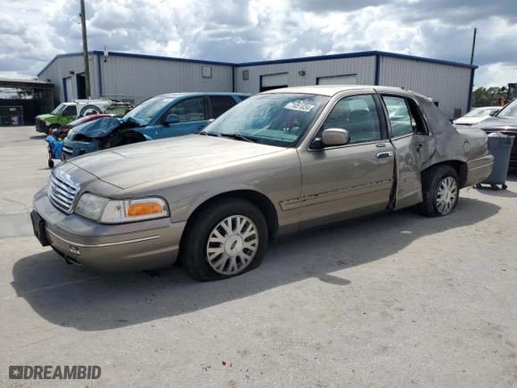 2003 Ford Crown Victoria LX with VIN 2FAHP74W63X124565, listed as a Copart auction lot 71051034 with 89,976 mi miles and Salvage Title. Bid and sale history available at carsss.com. Image 1.