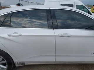2018 Chevrolet Impala LT z VIN 2G1105S38J9105958, wystawiony jako IAAI lot #41834706 z przebiegiem 131 195 mil mil oraz . Historia ofert i sprzedaży dostępna na DreamBid. Obrazek 14.
