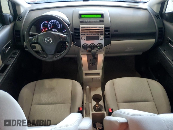 2010 Mazda 5 Sport with VIN JM1CR2W3XA0374407, listed as a Copart auction lot 61870014 with 196,210 mi miles and Salvage Title. Bid and sale history available at DreamBid. Image 8.