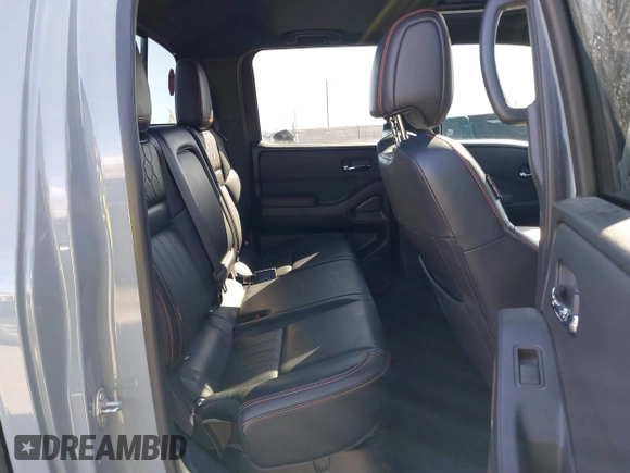 2023 Nissan Frontier SV with VIN 1N6ED1EK2PN633278, listed as a IAAI auction lot 41854671 with 59,549 mi miles and . Bid and sale history available at DreamBid. Image 8.