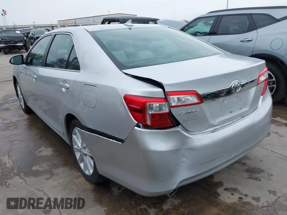 2014 Toyota Camry SE with VIN 4T1BK1FK7EU540975, listed as a IAAI auction lot 41673926 with 190,036 mi miles. Bid and sale history available at carsss.com. Image 3.